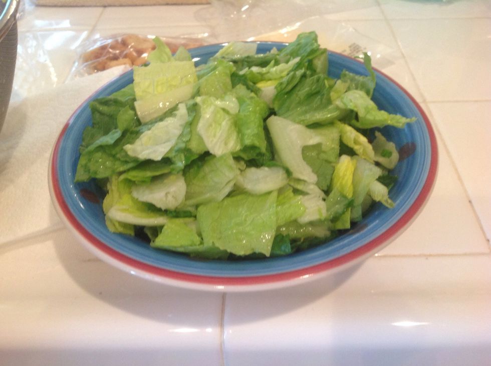 rinse the lettuce and put it in a bowl.