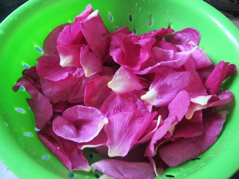 Rinse the rose petals to remove any dirt or bugs.