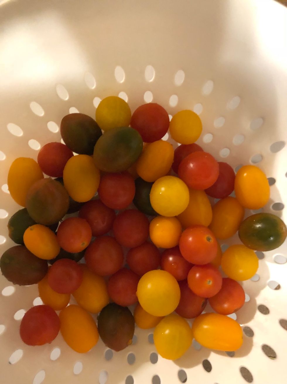Rinse tomatoes, no need to cut