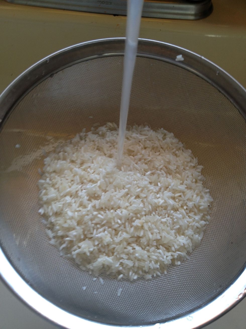 Rinse your rice under cold water until clear.