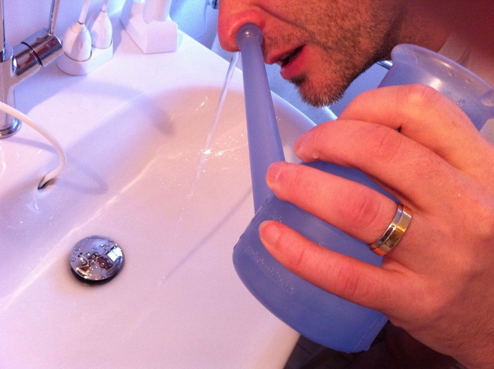 Rinse your sinuses with 1/2 the pot. Breath through your mouth. Make sure your wife doesn't watch.