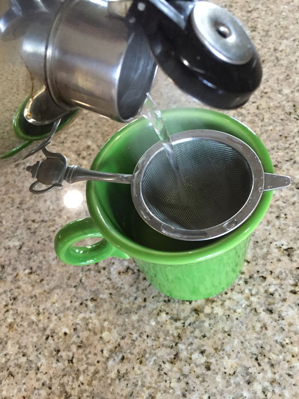 Rinse your supplies in hot water from the kettle to both clean and warm them. Discard the water.