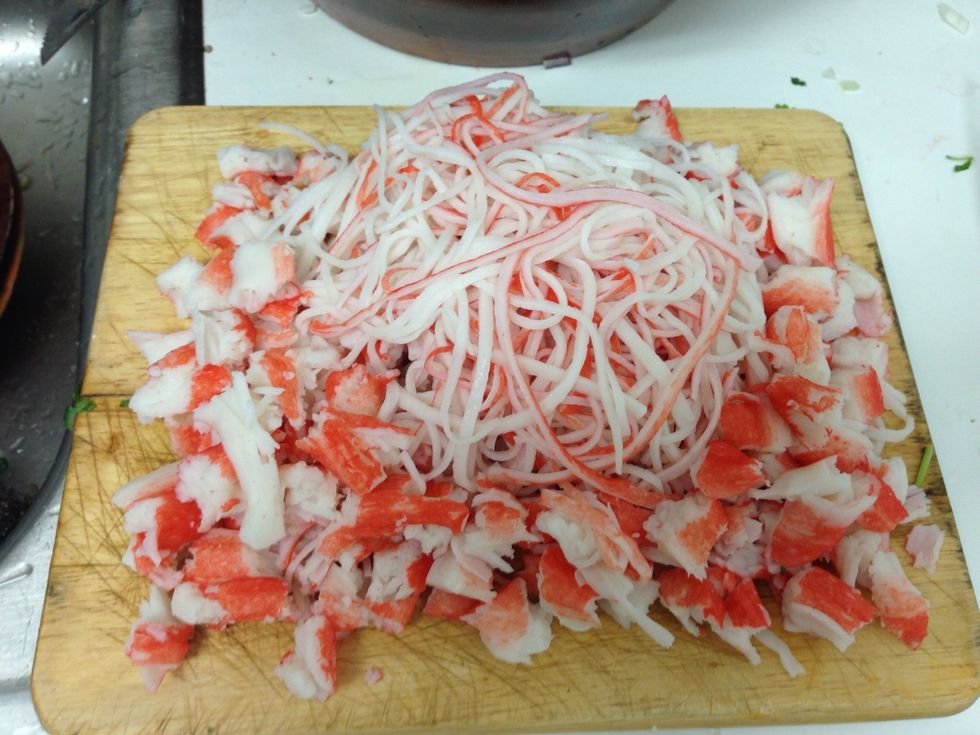 rip crabmeat it to thin pieces