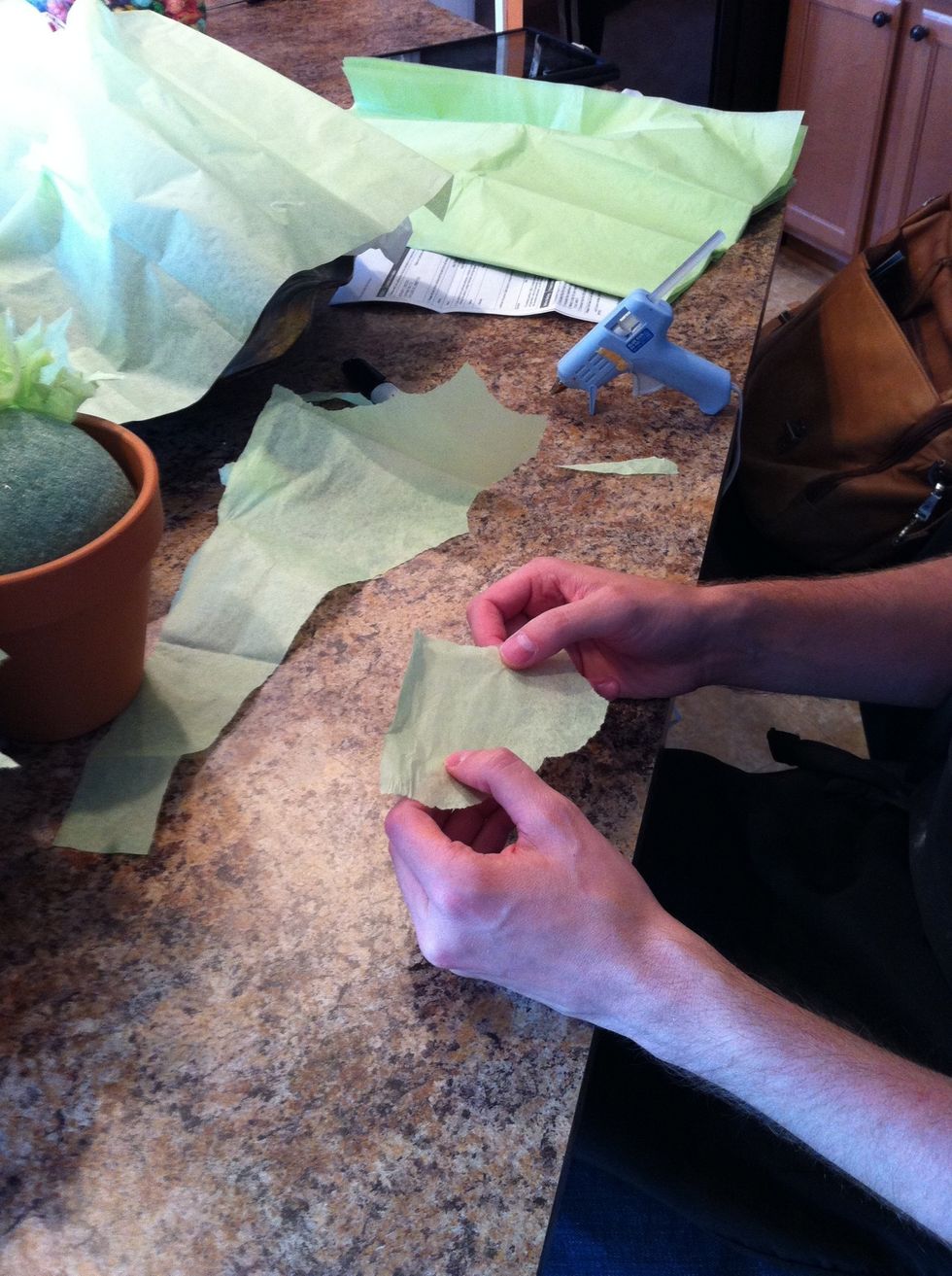 Rip (don't cut) tissue paper into various sizes