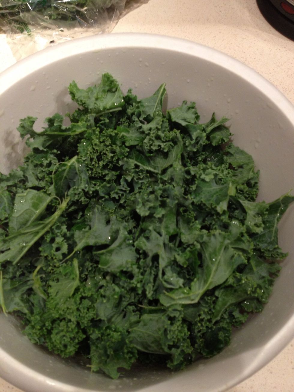 Rip or cut leaves into smaller shreds. Like salad sized leafs and put into a bowl