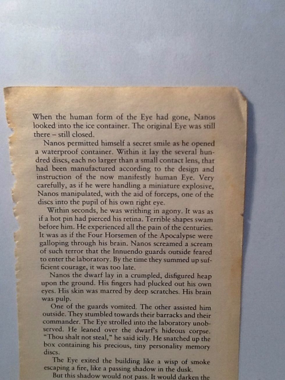 Rip out a page from an old book that you won't miss. I just ripped out the prologue, because that's not too essential.