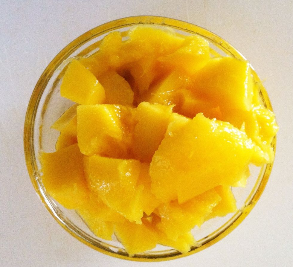 Ripe mango that is diced and pulped.
