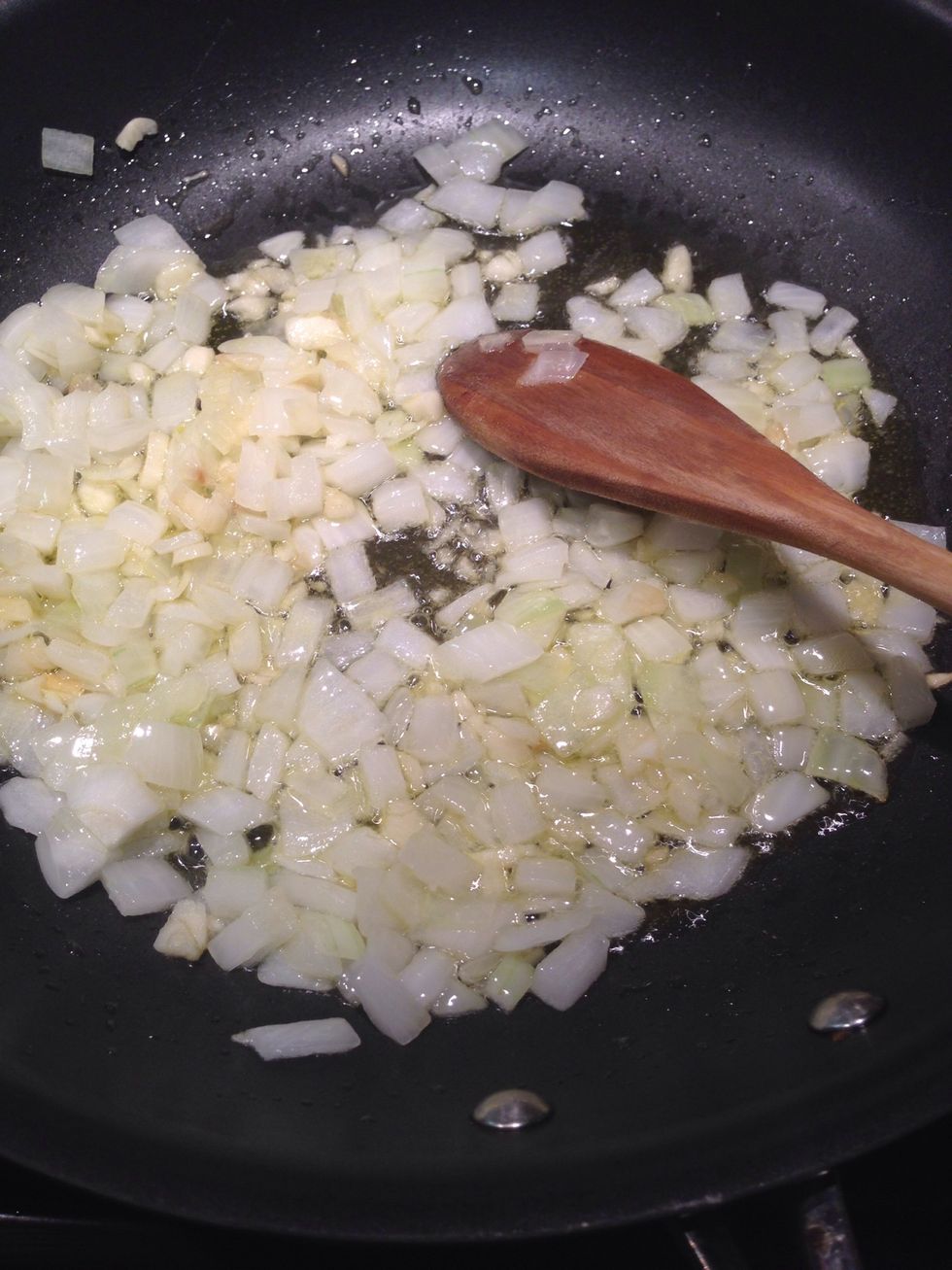 Risotto is, in my opinion, a dish of doing as you go, so I'm not adding measurements. You can get an idea by the photo or find a recipe if u like. Saut\u00e9 garlic and onions in EVOO in a large nonstick.