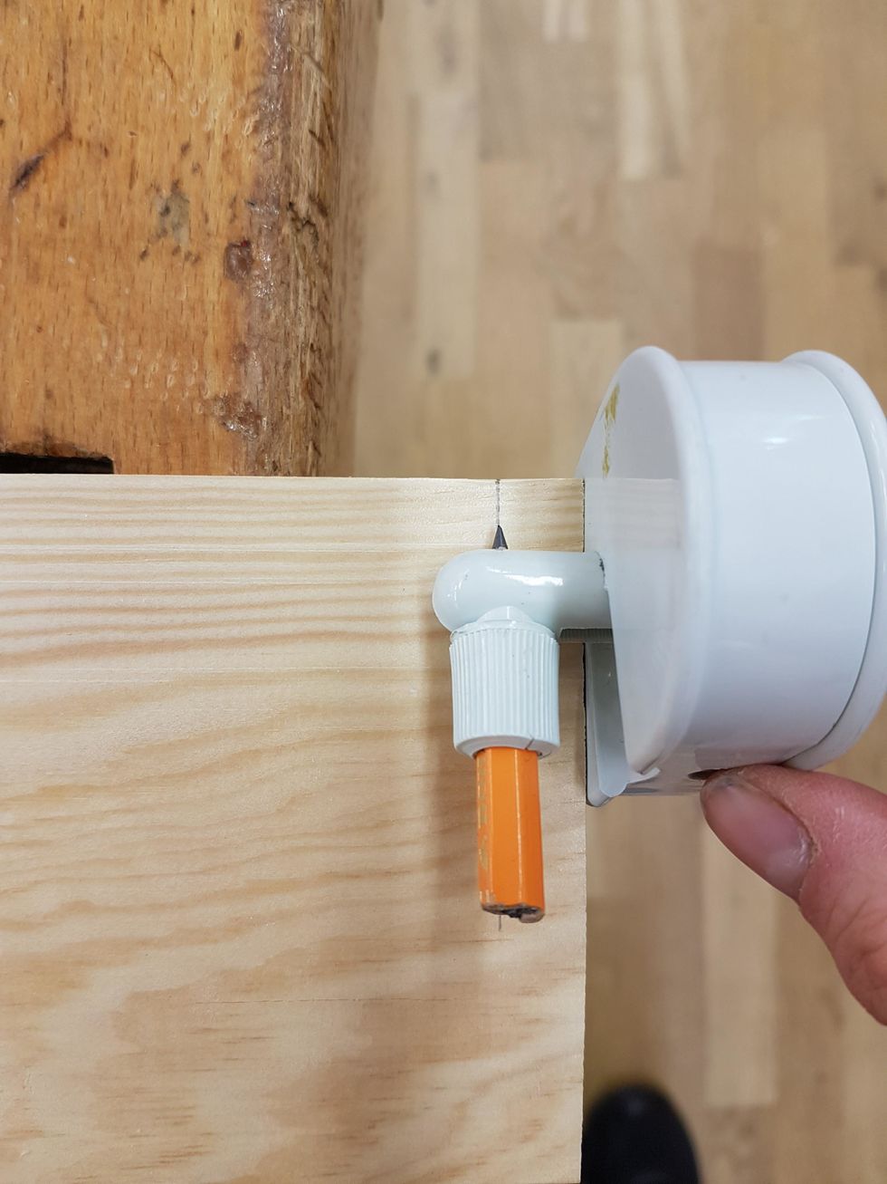 Rita en markering p\u00e5 kortsidorna.