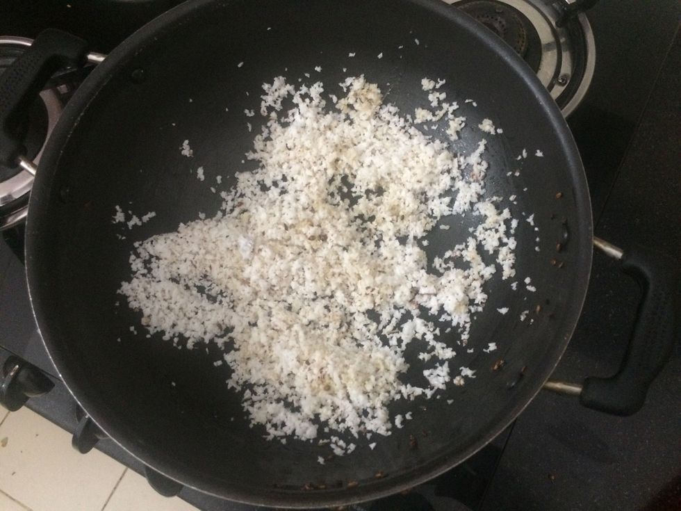 Roast grated coconut in medium flame