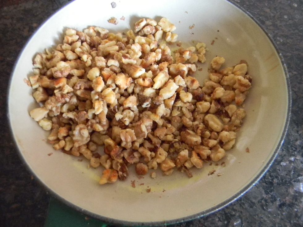 Roast the nuts in a pan until fragrant and let them cool to room temperature. I prefer using walnuts because they have a nice crunch but still are soft to bite. Pecans are also a good option.