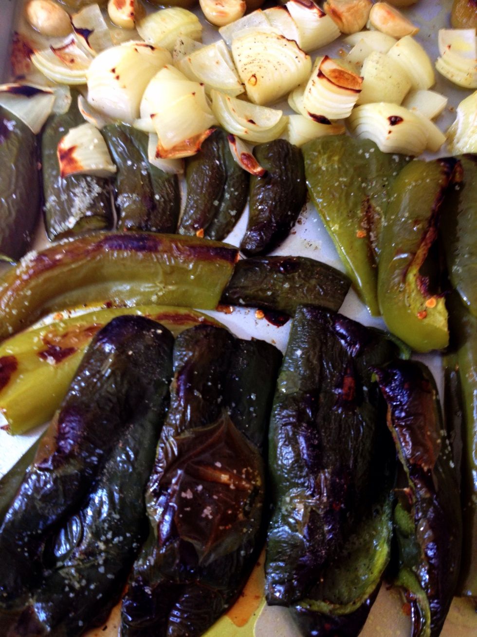 Roast vegetables in olive oil and sea salt in oven. Reserve a one (of three) onion and all potatoes to be added later. 15-20 minutes on 400 degrees.