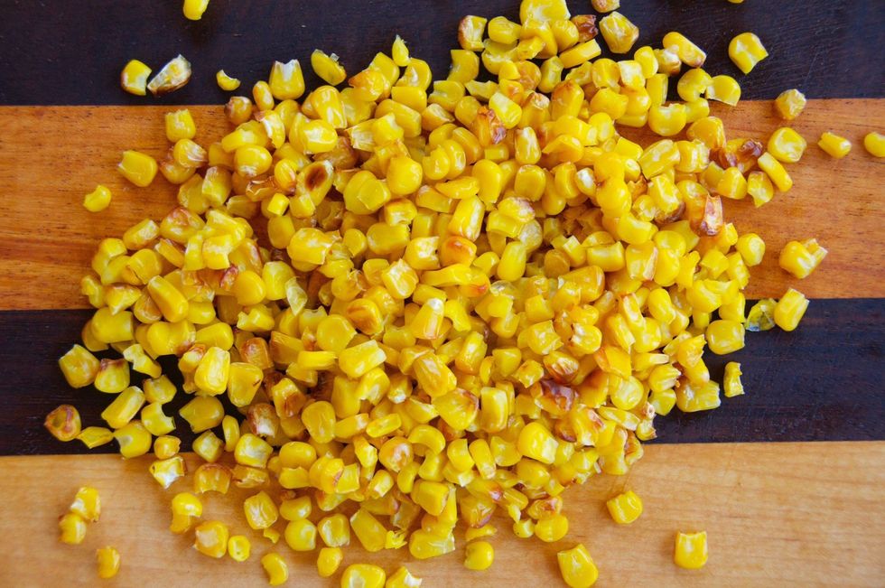 Roasting the corn is optional. If you have the time and a grill, it's even better if you grill it first, then remove the corn from the husk. Whatever you do, add 1 cup to the mixing bowl.