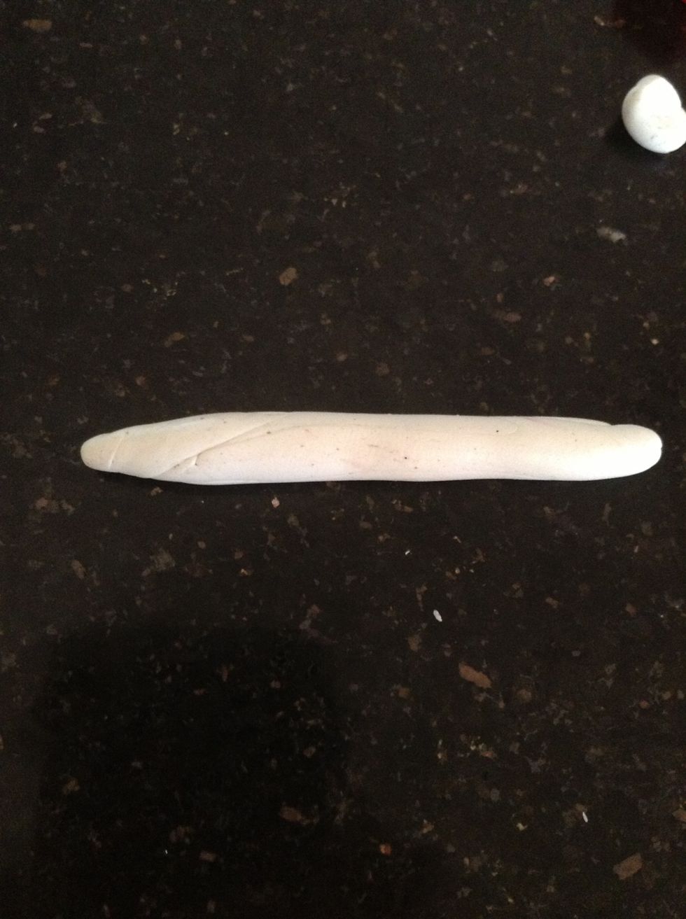 Roll a little more white clay .
