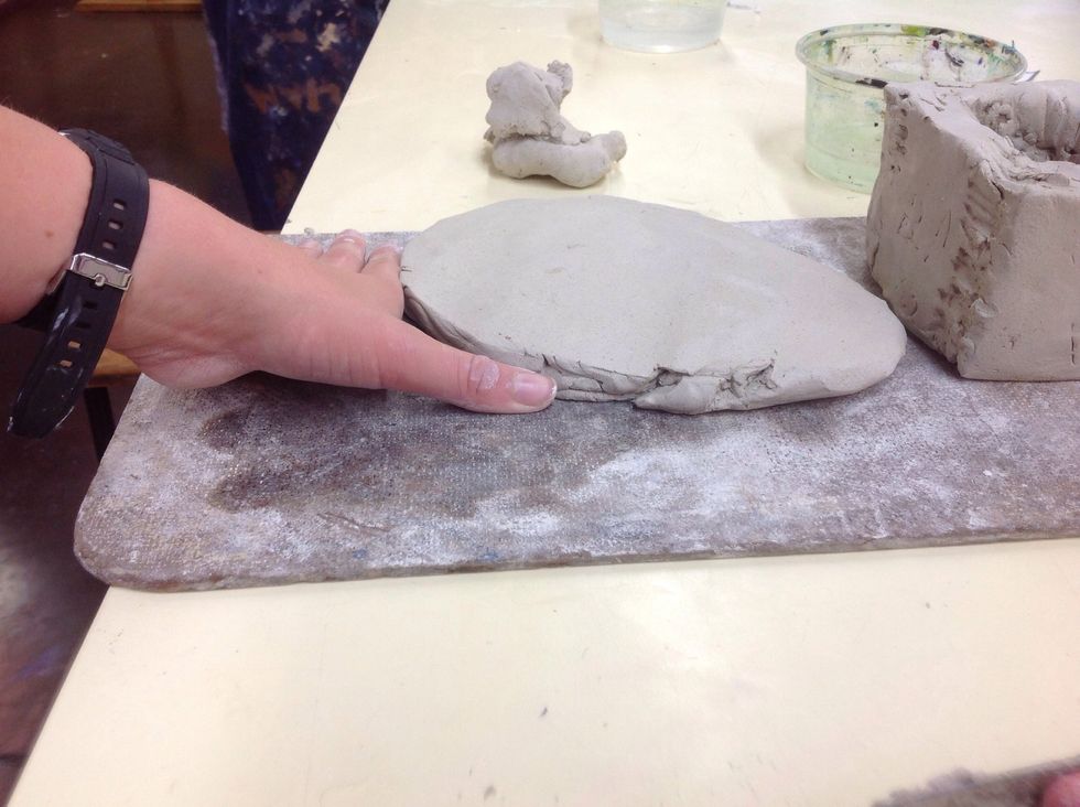 Roll another piece of clay the width of your finger