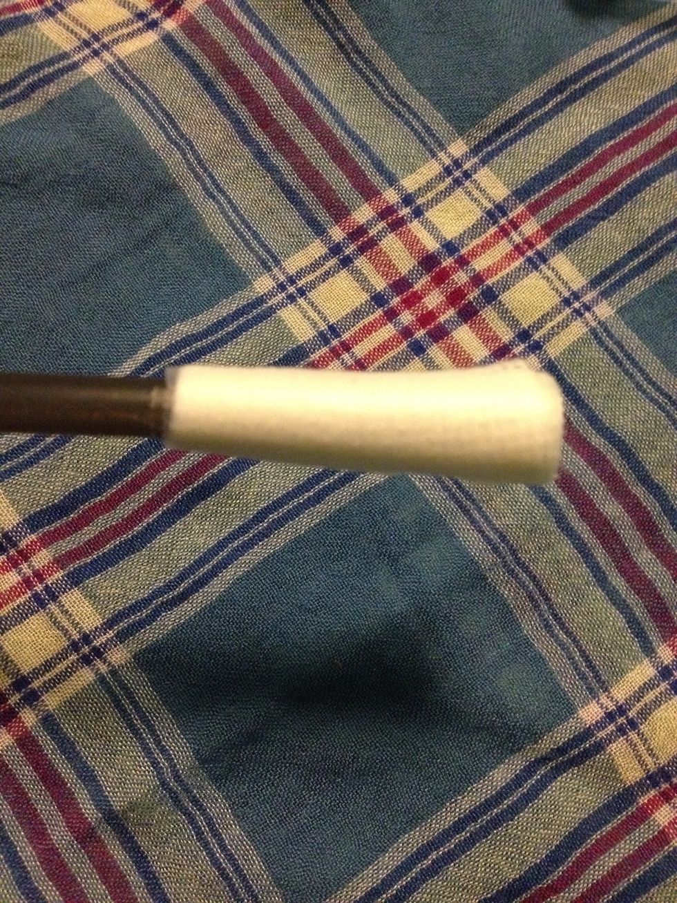 Roll around the pen and tape the end
