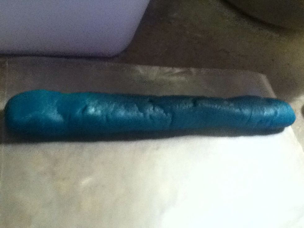 Roll Blue Dough into a 8in long log.