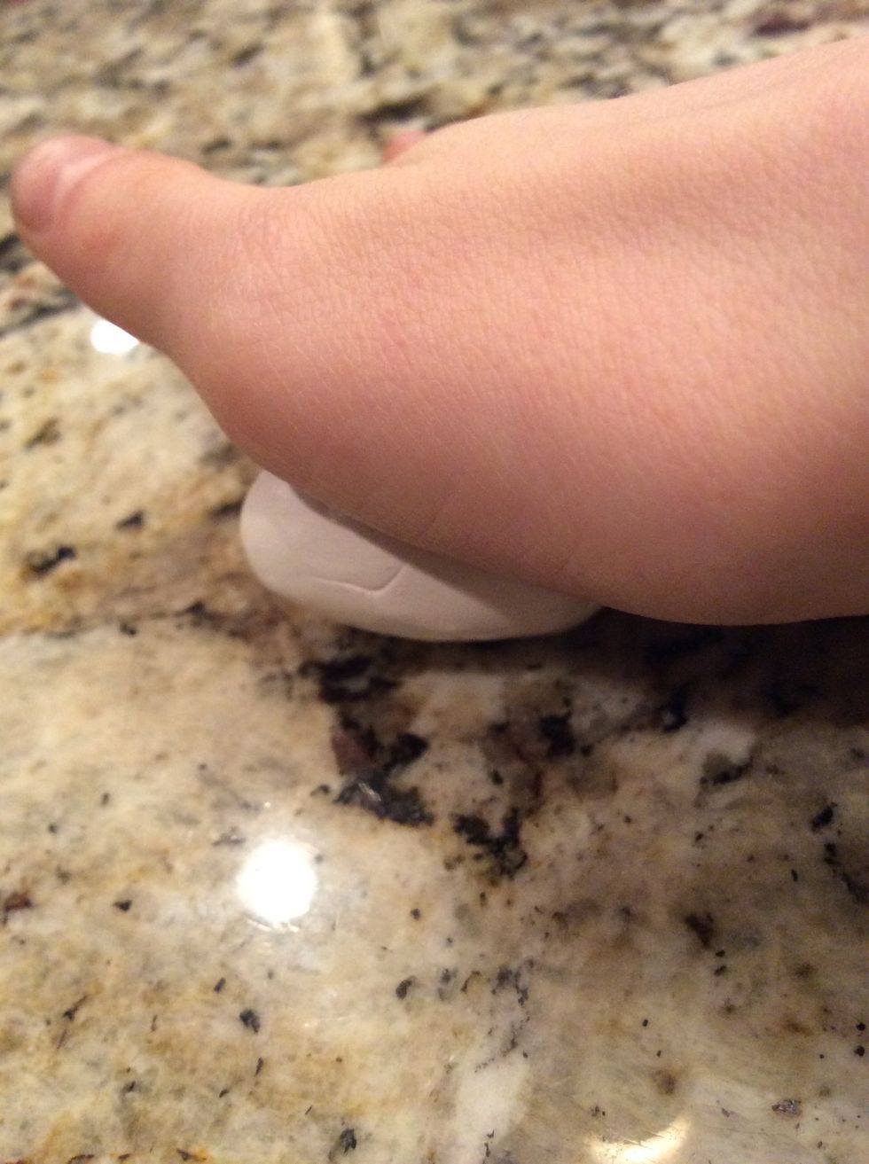 Roll both pieces of putty into a circular 3D shape!