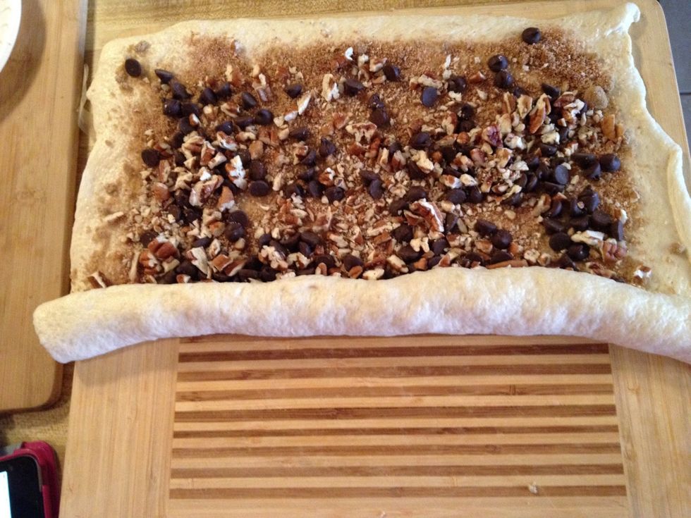 Roll crust to form a log