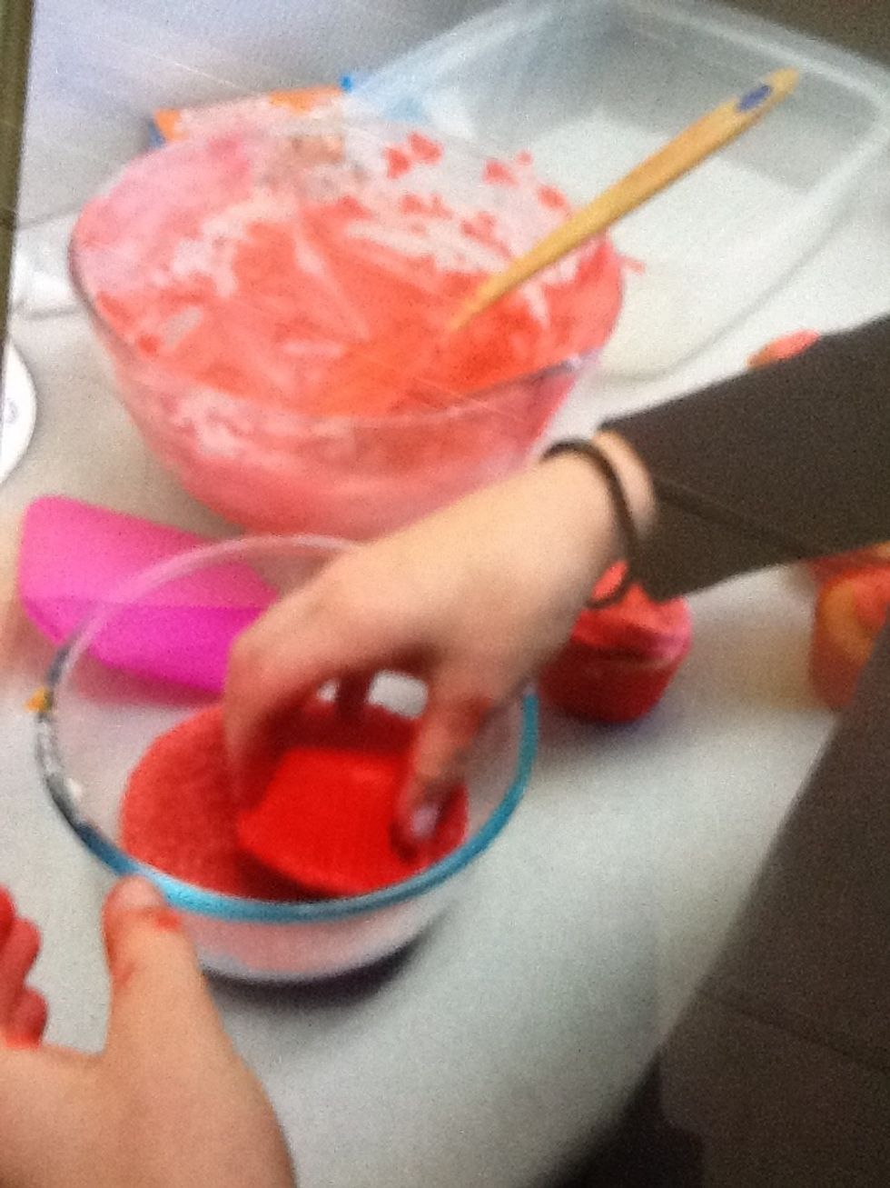 Roll cupcakes into the sugar dust