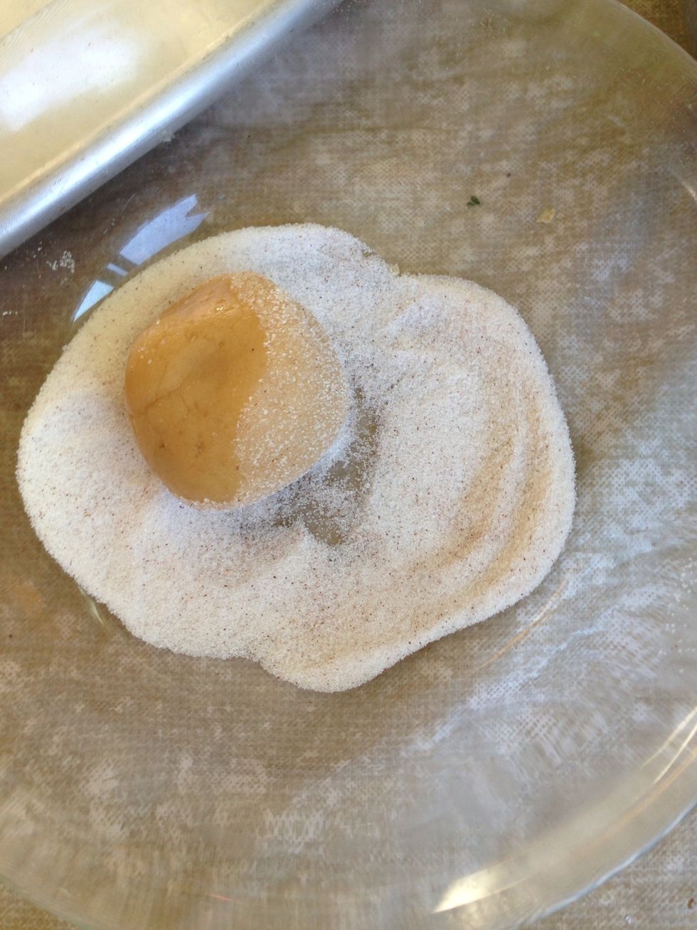Roll dough in sugar so it has a sugar coating