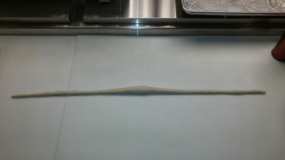 roll dough out into 2 foot ropes with a thick center.