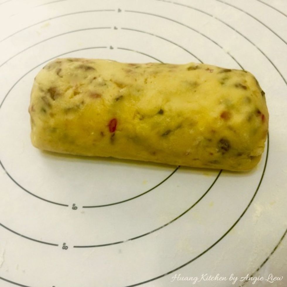 Roll each half of dough into a log, about 6 inches long and 2 inches in diameter.