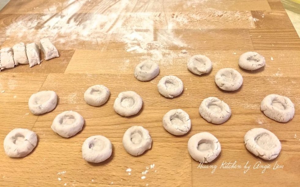 Roll each piece in between your palms to form round balls. Use your index finger to make a slight depression in the centre to make it looks like an abacus seed.