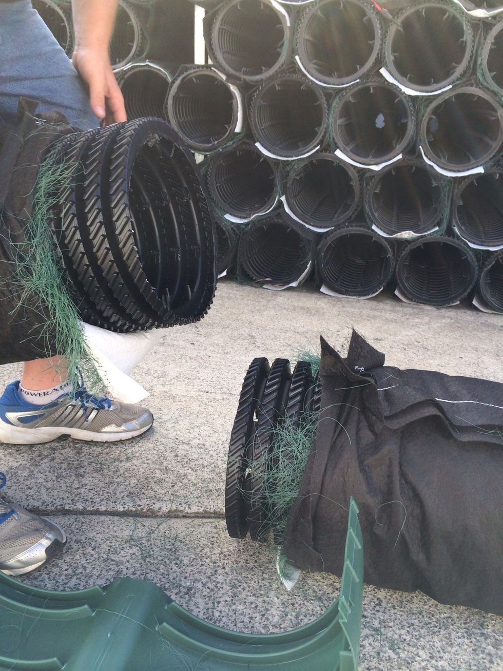 Roll fabric back the same on both pipes.