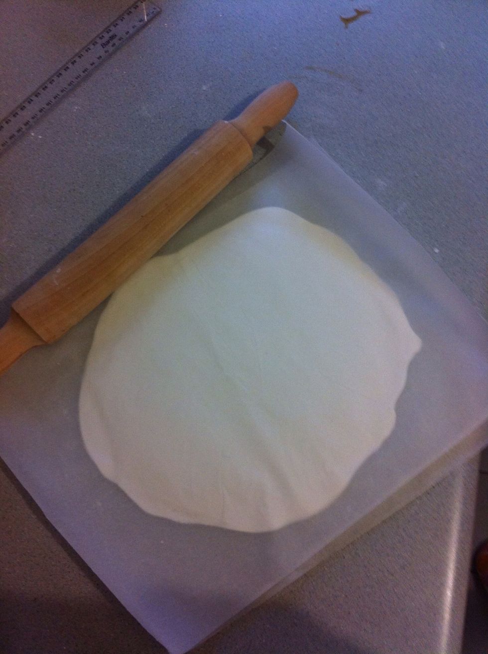Roll fondant out between 2 sheets of baking paper to being 5mm thick.