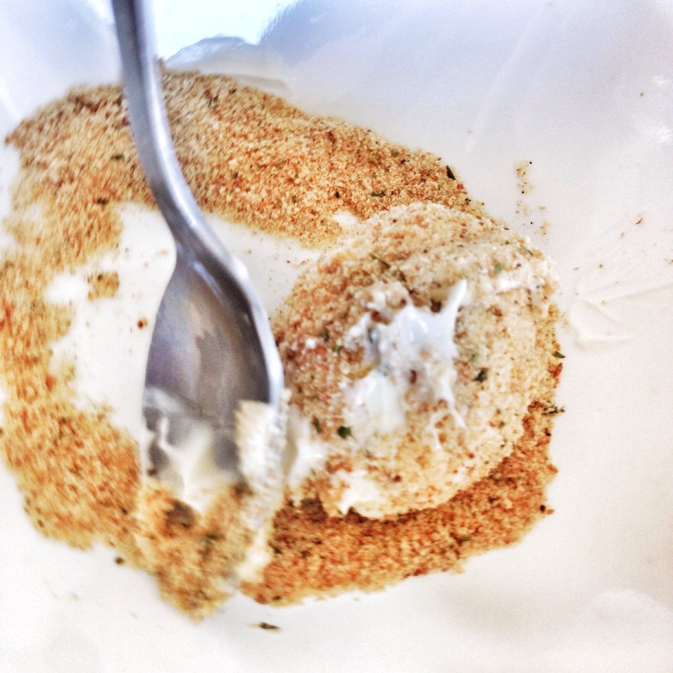 Roll hard boiled egg in bread crumbs.