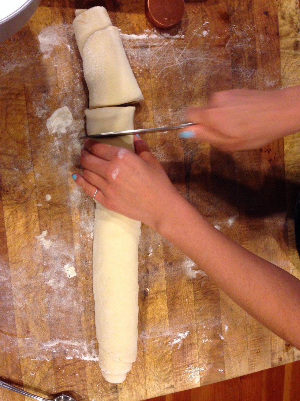 Roll into a log, cut into 12 equal pieces.