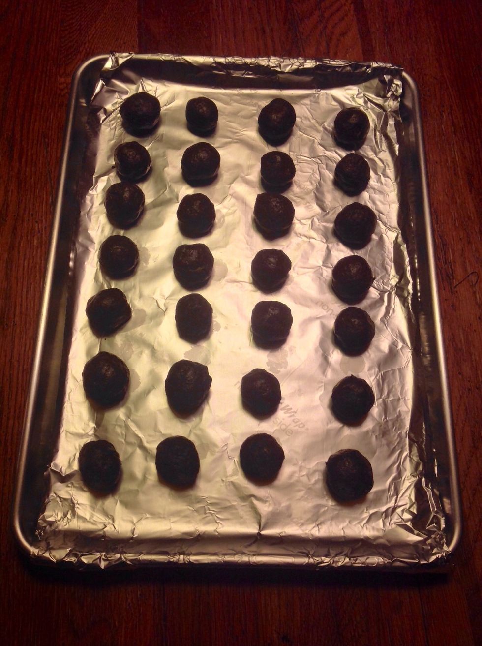 Roll into balls and place on baking pan. Place in freezer until firm.