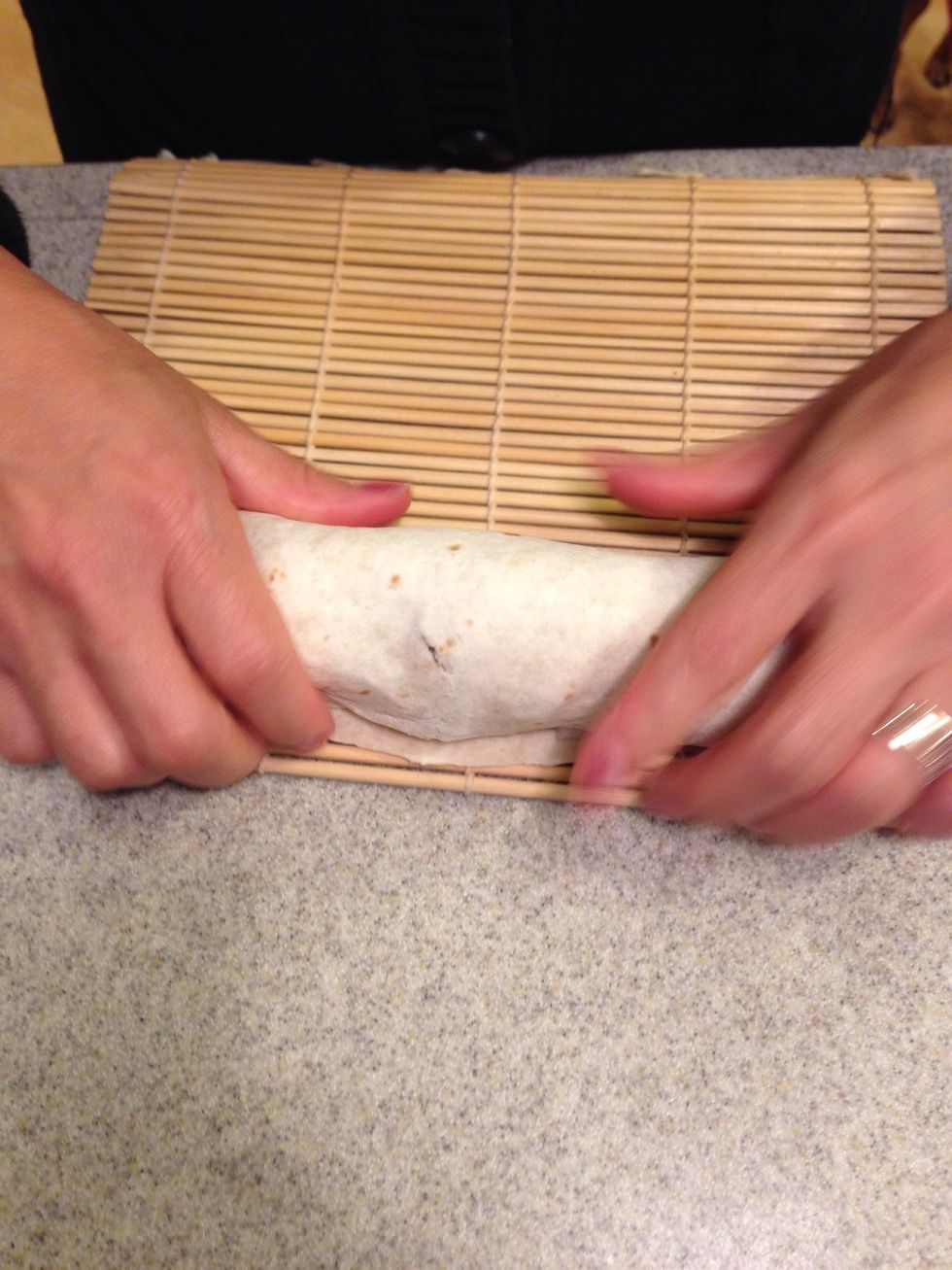 Roll it as tight as you can.