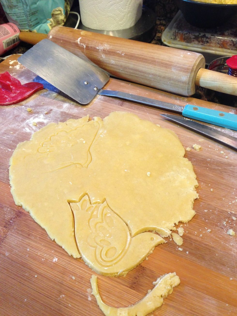 Roll it. Cut off with cooky stamp