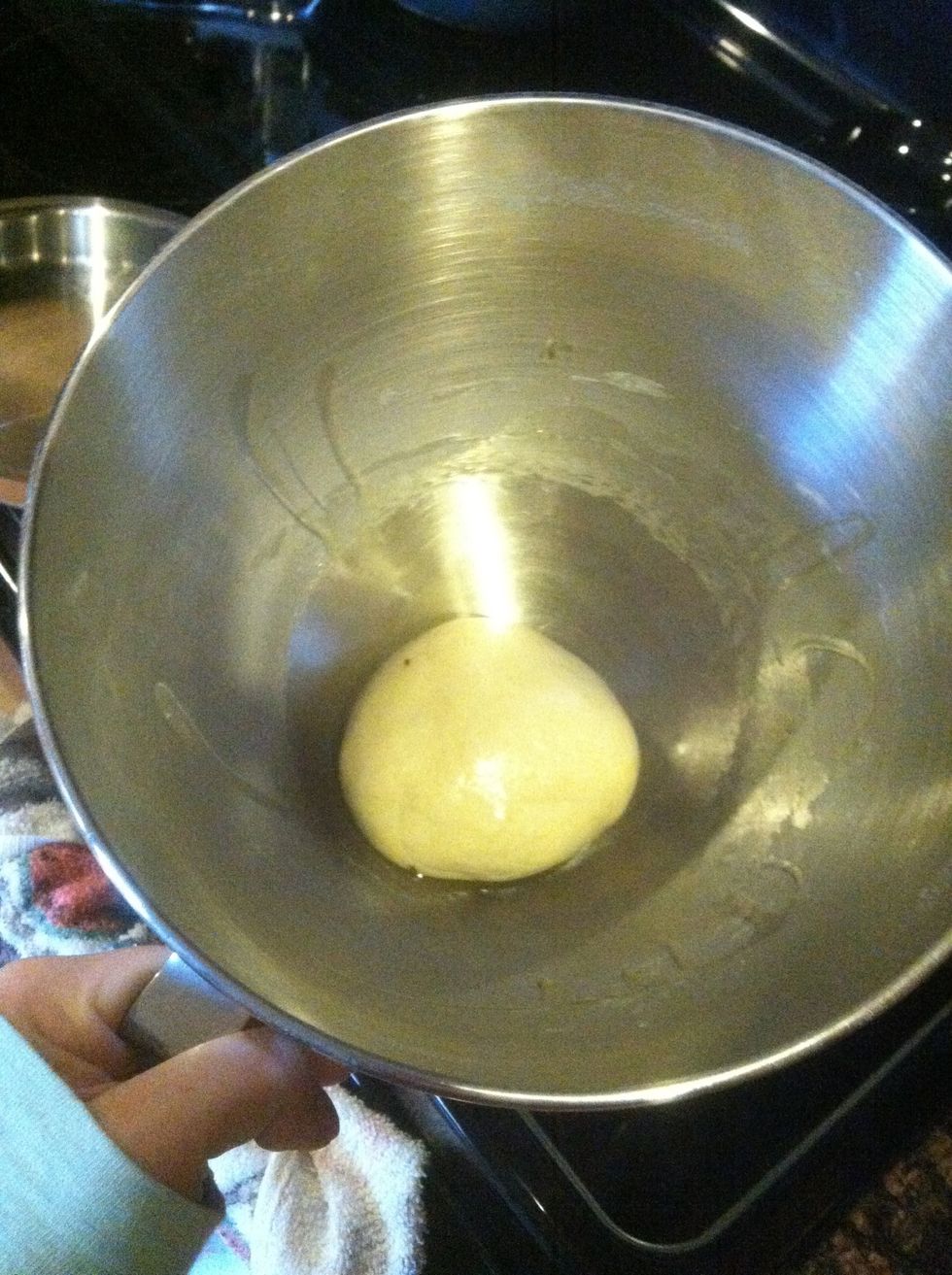 Roll it into a ball and stick it into the fridge. I know you want to make a pizza right now but letting it rise in the fridge for at least two days will help bring out some really good yeasty flavor.