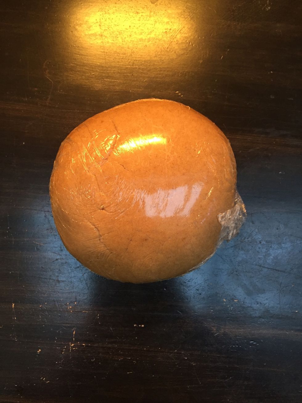 Roll it into a ball, cover with cling film and refrigerate for around half an hour, the longer the better!