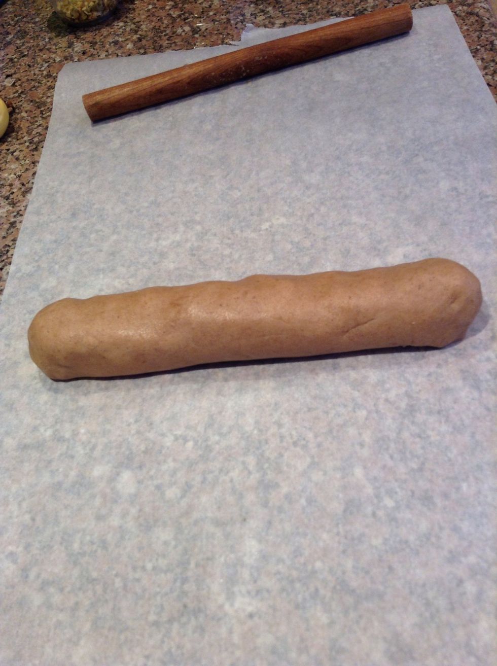 Roll it into a log shape on parchment paper. Should be about 12".