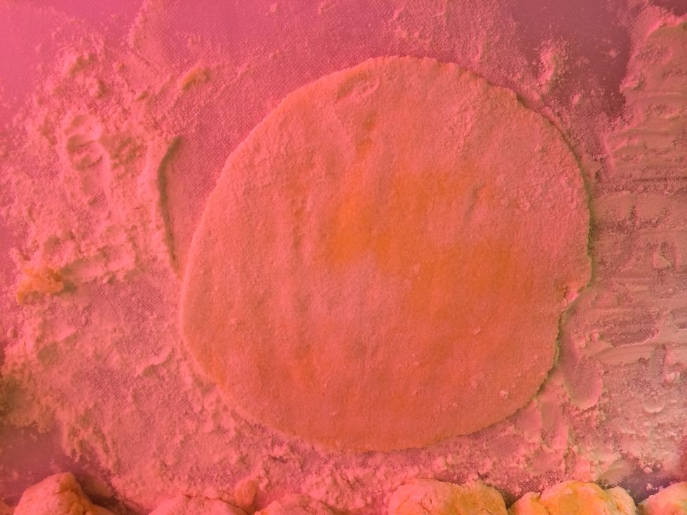 Roll it out into a large flat circle.