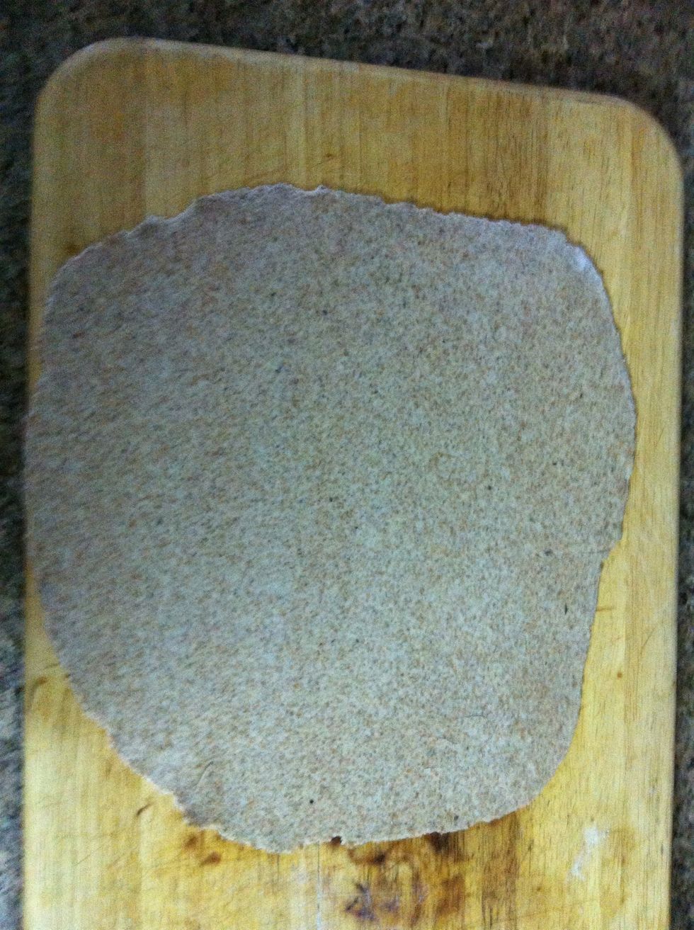 Roll it out really thin, it doesn't need to be a perfect circle, when was the last time you had a wood oven pizza that was shaped perfectly? Keep it nice and simple, rustic!