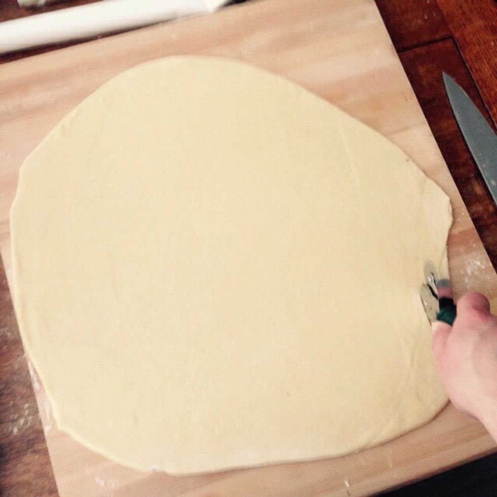 Roll it out to a 45cm by 45cm squarish shape and then cut the edges. You can make pain au chocolat with them by rolling a piece of dark chocolate in the middle.