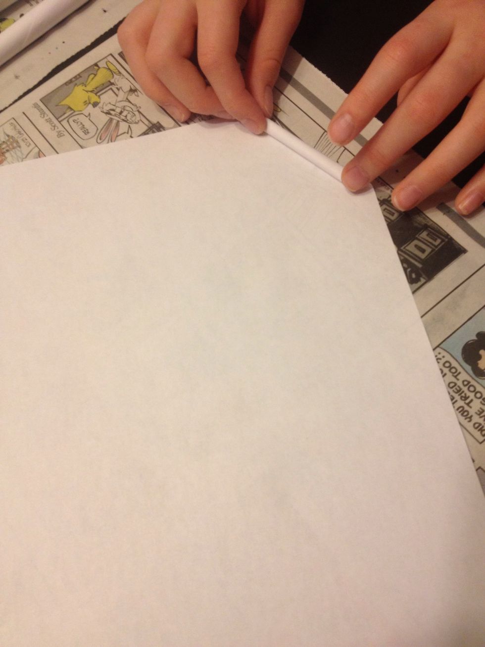 Roll it up from one end, so one end is smaller and the other wide