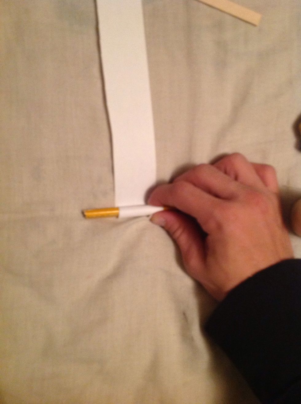 Roll it up with a pencil.