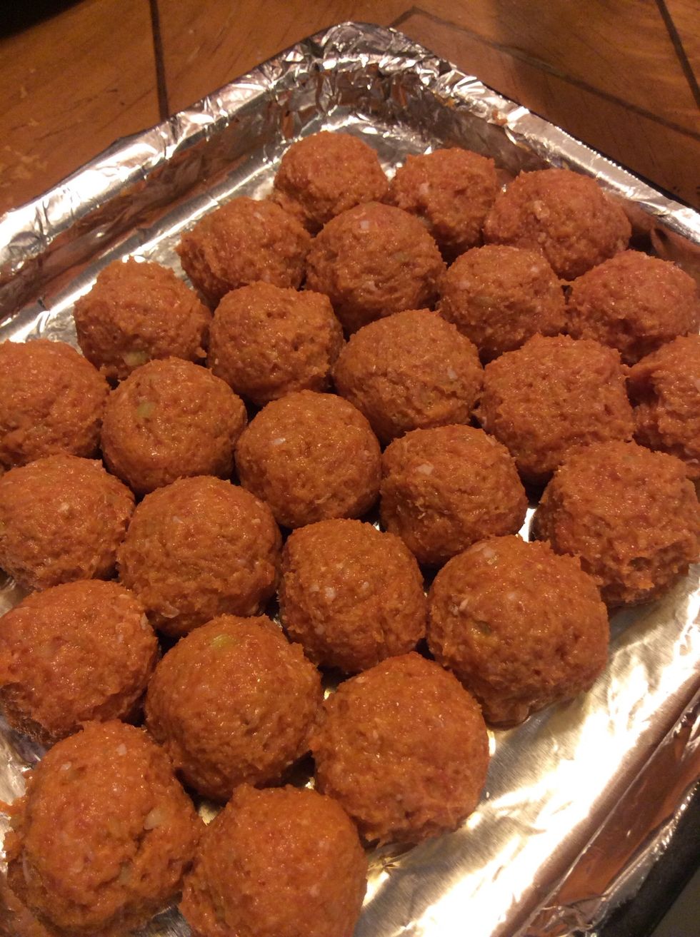 Roll mixture into 3/4in balls and starting from the middle place balls so they are touching...