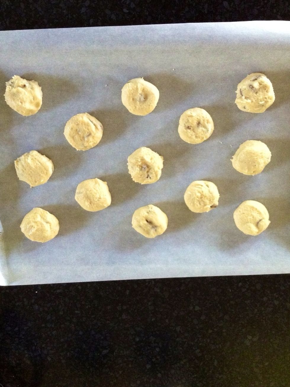 Roll mixture into small balls and place on a greased baking tray