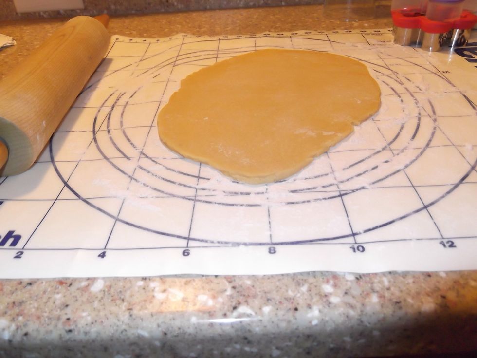 Roll out dough 1/4 inch thick, cut cookie with a cookie cutter.