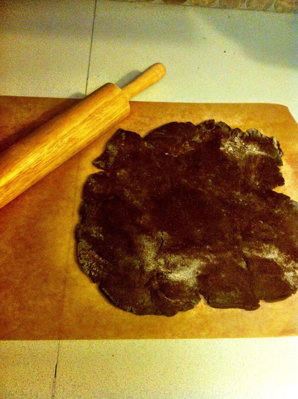 Roll out dough (flipping, turning, and reflouring as needed) until you have it at about 1/8 thickness.
