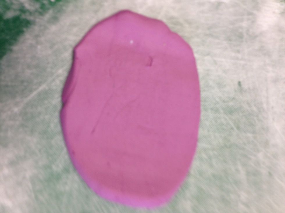 Roll out fondant with a rolling pin- around half a centimetre thick, make sure there's icing sugar on your bench top or bread board to prevent sticking