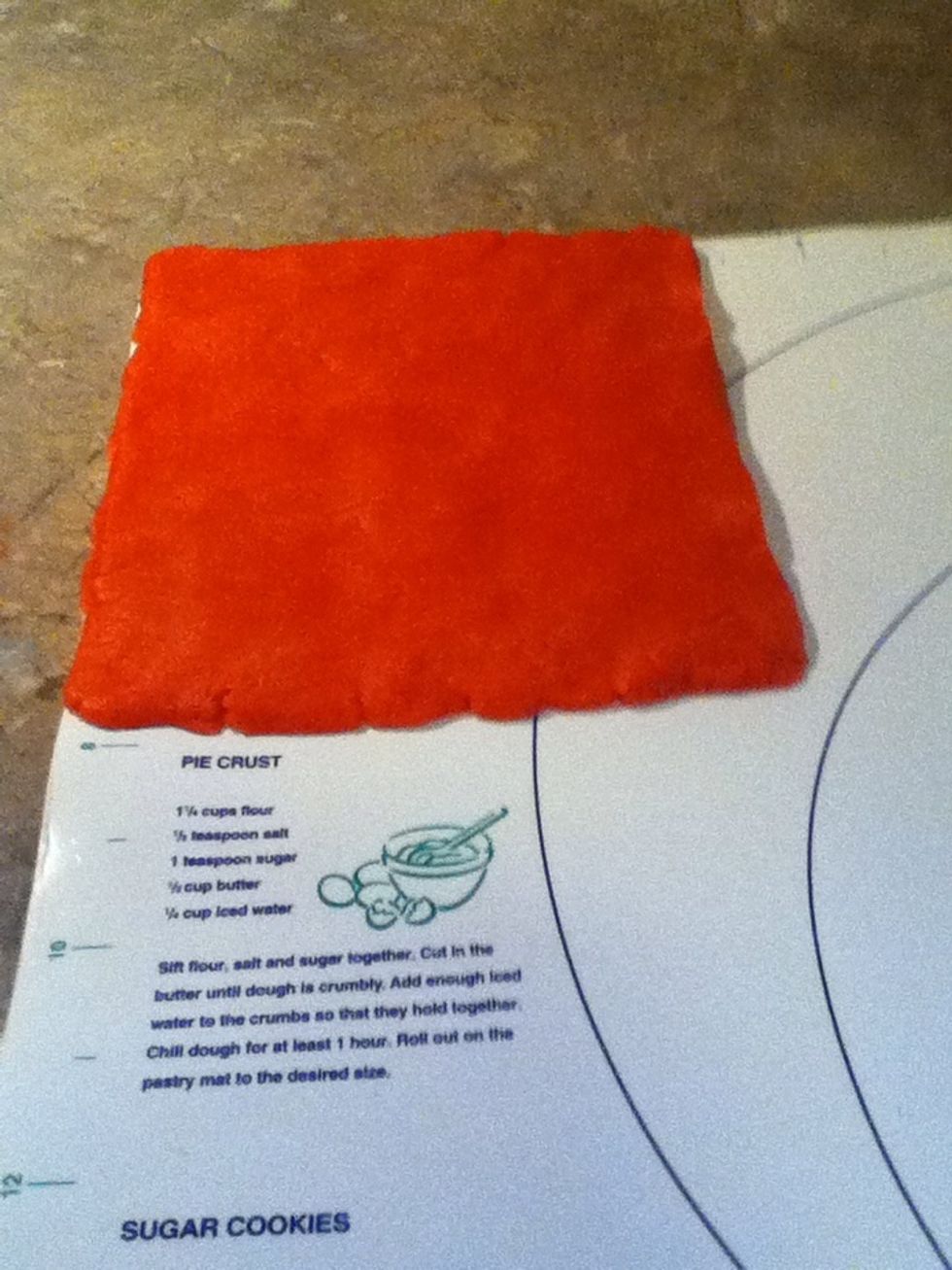 Roll out red dough to 8x7 inches.