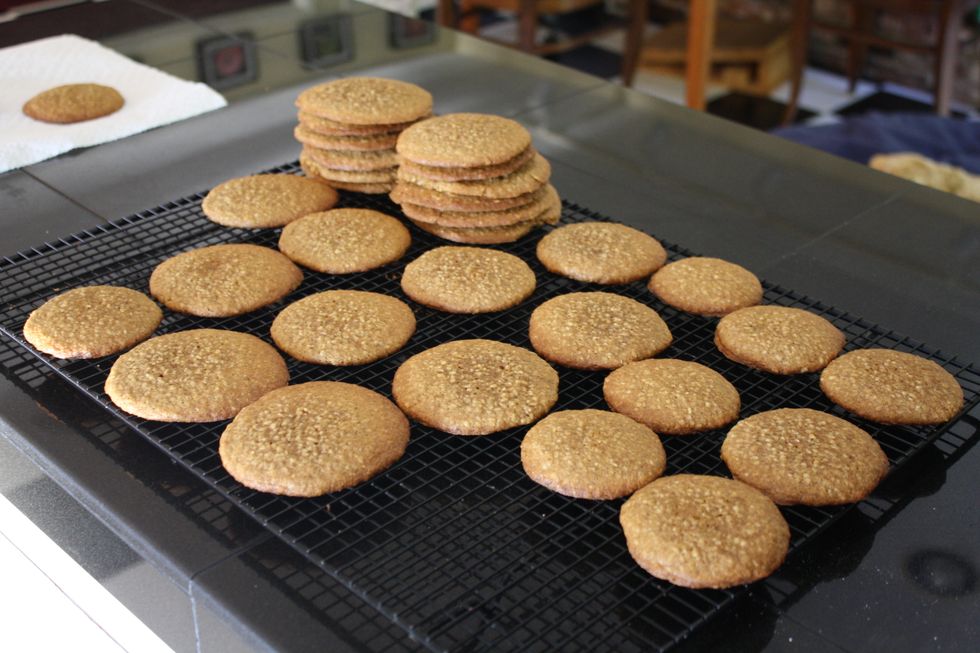 Roll out the chilled dough in tablespoon sized balls, nine cookies to a sheet. Bake at 350 F for 10 minutes. Let them cool on wire racks. 